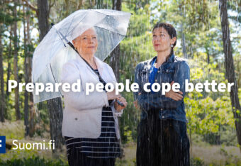 Two women in the rain. One of them is prepared with an umbrella, while the other one is not. Prepared people cope better.